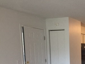 bright white clean cabinets, wood flooring, lots of storage at regency apartments in Bettendorf Iowa